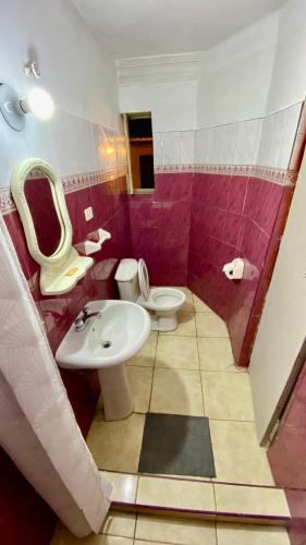 a bathroom with a sink and a toilet at Templo de la Luna in Cusco