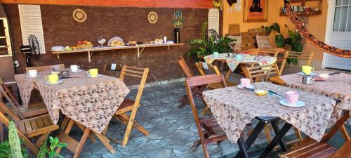 Restaurace v ubytování Pousada e SPA Shiva São Sebastião 200mts da praia