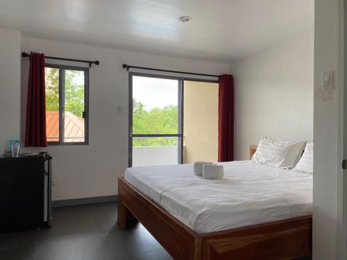 Ένα ή περισσότερα κρεβάτια σε δωμάτιο στο Malipaj Apartments