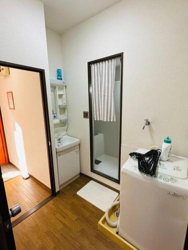 A Traditional Home with a View of Tsutenkaku