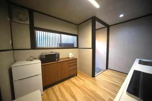 Η κουζίνα ή μικρή κουζίνα στο 宿ZEN