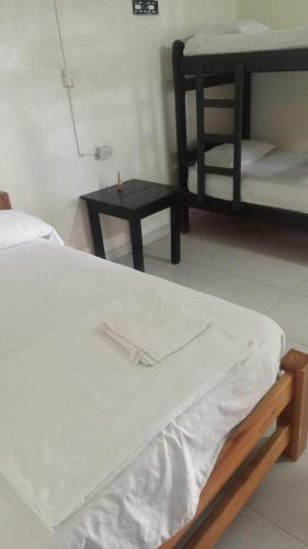 Postel nebo postele na pokoji v ubytování Cabañas el paisa tours