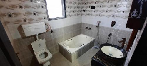 Koupelna v ubytování Gautami Villa
