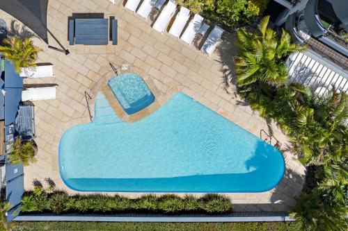 an overhead view of a swimming pool in a resort at Pacific Resort Broadbeach in Gold Coast