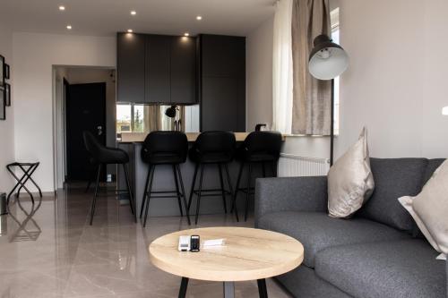 Χώρος καθιστικού στο Hugo apartments
