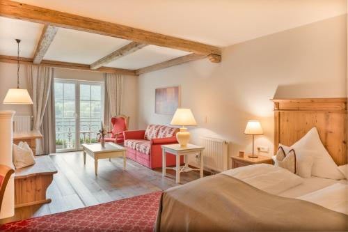 Posteľ alebo postele v izbe v ubytovaní Waldhof Fuschlsee Resort
