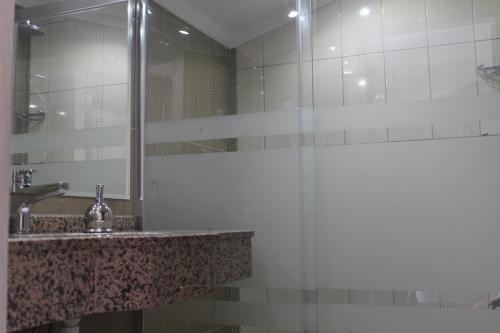 A bathroom at Ida Hotel