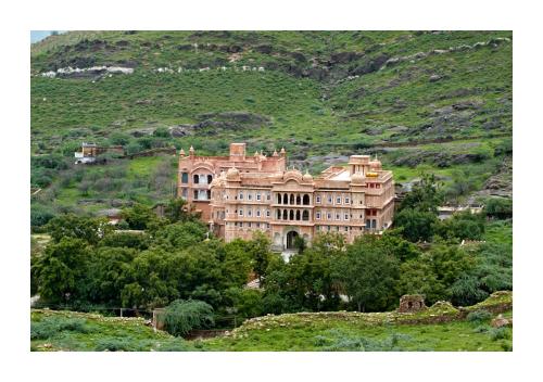 a large building on top of a hill at Patan Mahal in Pātan