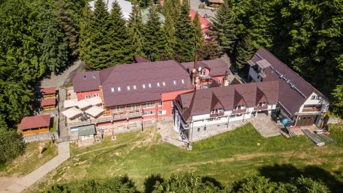 an aerial view of a large house on a field at Suior Resort Baza in Baia-Sprie