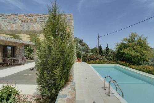 Πισίνα στο ή κοντά στο Ouzo Stone House 1 with private pool