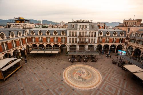an aerial view of a building with a courtyard at Piazza Boutique Hotel in Batumi