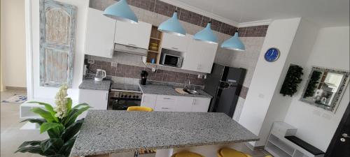 Кухня или мини-кухня в Penthouse New Administrative Capital
