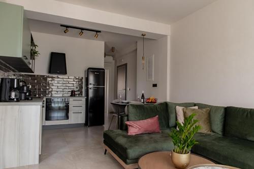 Η κουζίνα ή μικρή κουζίνα στο Chelmis Sea Front Apartments - Atlantis