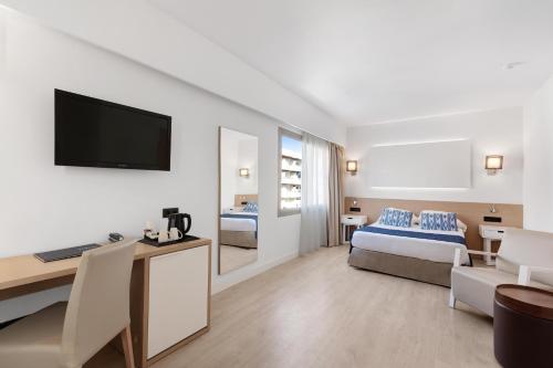 Ένα ή περισσότερα κρεβάτια σε δωμάτιο στο THB Los Molinos - Adults Only