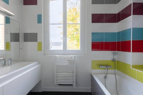 Kúpeľňa v ubytovaní Villa Isaac - Luxueuse - Parking - 16p - Rêve au Mans
