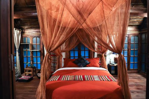 Tempat tidur dalam kamar di Lua Pu Luong