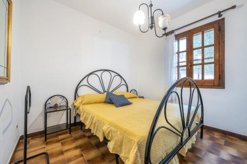 Ένα ή περισσότερα κρεβάτια σε δωμάτιο στο La Casa delle Rose