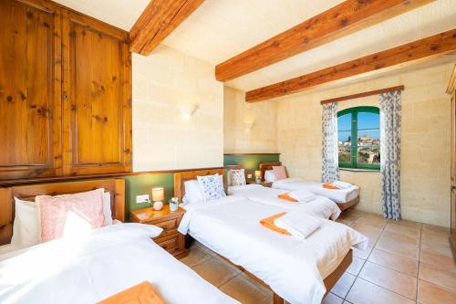Postel nebo postele na pokoji v ubytování Ta Kalang Holiday Home