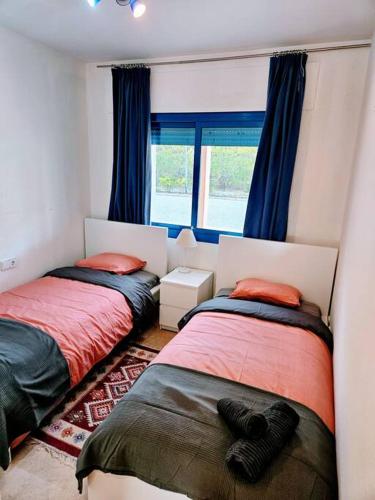 Duquesa Suites Gardens ground floor close to Port, beach