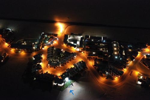 an aerial view of a city at night at Ocean Dream Beach Cottage in Swakopmund