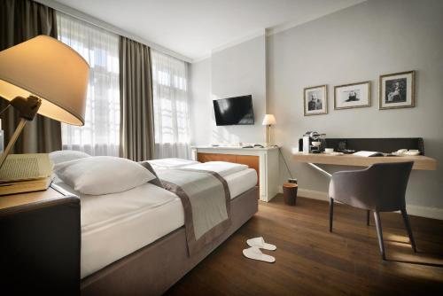 TV a/nebo společenská místnost v ubytování Design Hotel Neruda