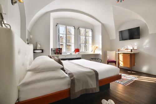 Postel nebo postele na pokoji v ubytování Design Hotel Neruda