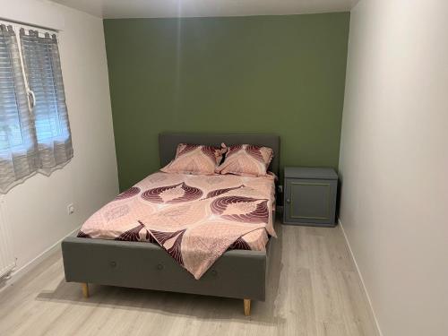 Katil atau katil-katil dalam bilik di Sublime appartement T3