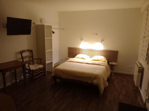 Postel nebo postele na pokoji v ubytování Chambre studio