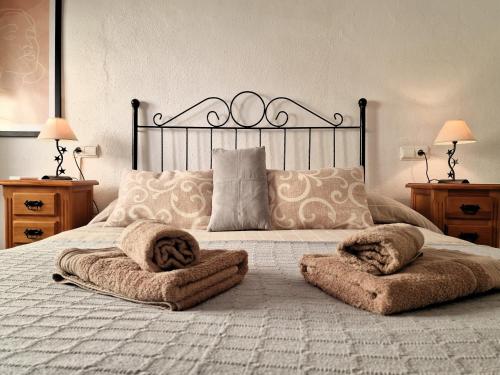מיטה או מיטות בחדר ב-DS Apartamento en plena Mezquita, con vistas