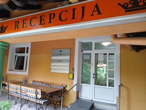 a restaurant with a table and chairs in front of it at Car Konaci in Smederevo