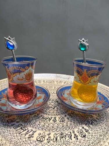 two vases sitting on top of a table at Casa do Zafer in Sao Paulo