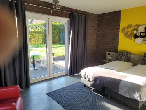 Posteľ alebo postele v izbe v ubytovaní Het Wit Huys
