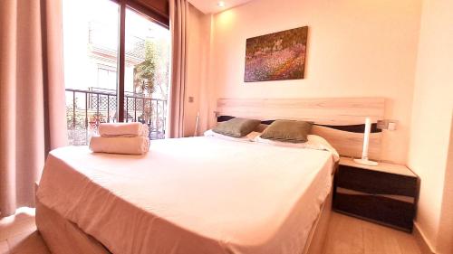 Postel nebo postele na pokoji v ubytování Apartamentos Vacacionales Joctis, 1º A