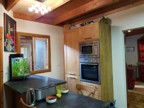 a kitchen with a sink and a stove top oven at Home Sweet Home in Brest