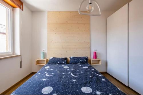 Letto o letti in una camera di WoodenKey Asiago moderno bicamere in centro