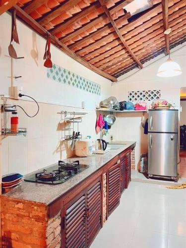 Kuchyň nebo kuchyňský kout v ubytování Tứ Quý Villa