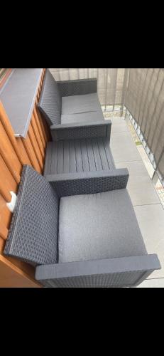 a set of steps with grey cushions on the floor at Apartmán v Kašperských Horách in Kašperské Hory
