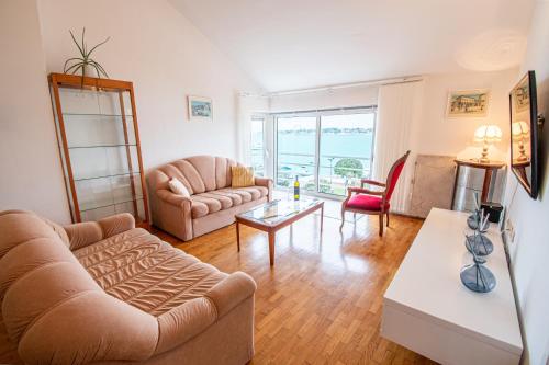 Гостиная зона в Apartment Umag Center Istria Croatia with seaview by Rentistra