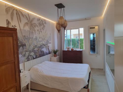 Postel nebo postele na pokoji v ubytování Villa lujosa con spa, piscina y sala de juegos PRIVADOS