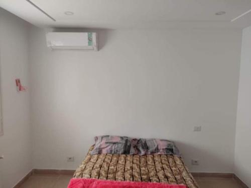 מיטה או מיטות בחדר ב-Monastir: superbe appartement neuf (2020)