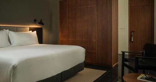 Letto o letti in una camera di Mercer Plaza Sevilla 5 GL