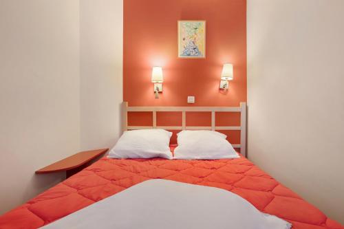 Ένα ή περισσότερα κρεβάτια σε δωμάτιο στο Appartement Cap Esterel St Raphaël