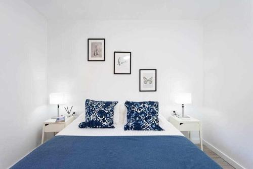 Säng eller sängar i ett rum på Preciosa vivienda cerca de la playa y Wifi