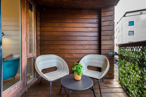 two chairs and a table on a patio at Host & Stay - Ropewalks Quarters in Liverpool