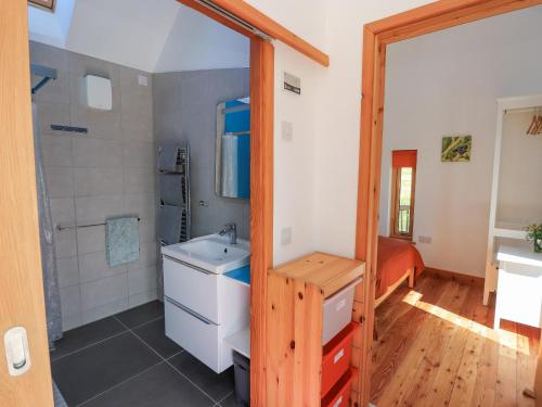 a bathroom with a sink and a shower at Easter Blervie in Forres