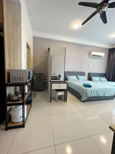 Katil atau katil-katil dalam bilik di Plazio 1 Bedroom & Studio