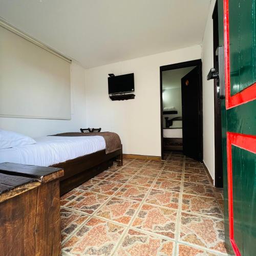 Ένα ή περισσότερα κρεβάτια σε δωμάτιο στο Hotel Boutique Samay