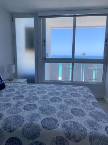 Postel nebo postele na pokoji v ubytování KASA Blue Ocean