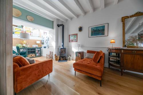 Coin salon dans l'établissement Grande Maison Cusset - Maison de ville et Studio