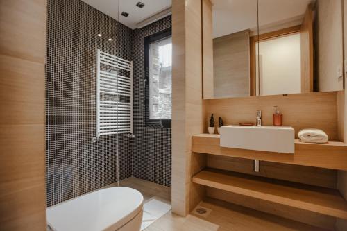 Vannituba majutusasutuses Gloom 3-BR Apt in Tilal Faqra